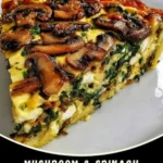 Slice of crustless mushroom and spinach quiche with golden top